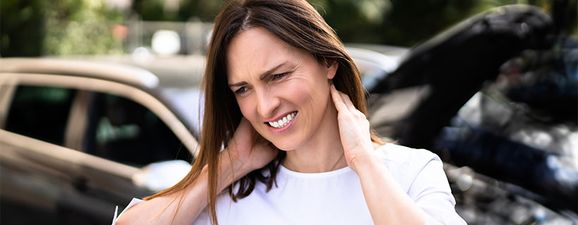 Patient suffering from Whiplash in need of chiropractor in Cumming